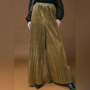 Gold wide leg pants with elastic waist and pockets.  Worn once.